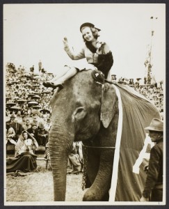 Sue Donegan, 1947 University of Alabama Homecoming Queen, riding Alamite the elephant