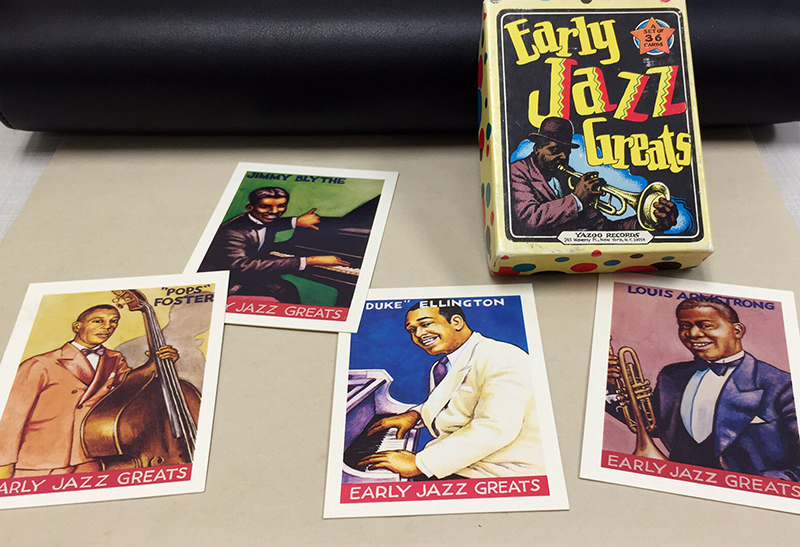 Box and four examples from the trading card set Early Jazz Greats