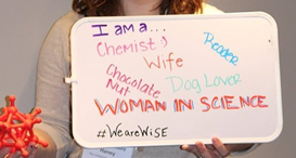 photo of whiteboard with written text "I am a chemist, wife, reader, dog lover, woman in science"