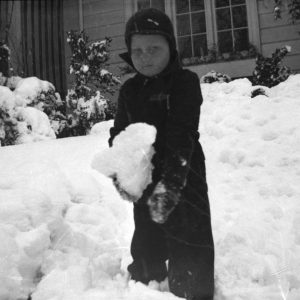 Harry Brandt Ayers playing in the snow, late 1930s
