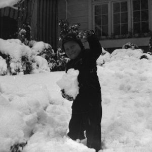 Harry Brandt Ayers playing in the snow, late 1930s