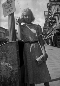 Elise Ayers posing on an Anniston, Alabama, street corner, late 1930s